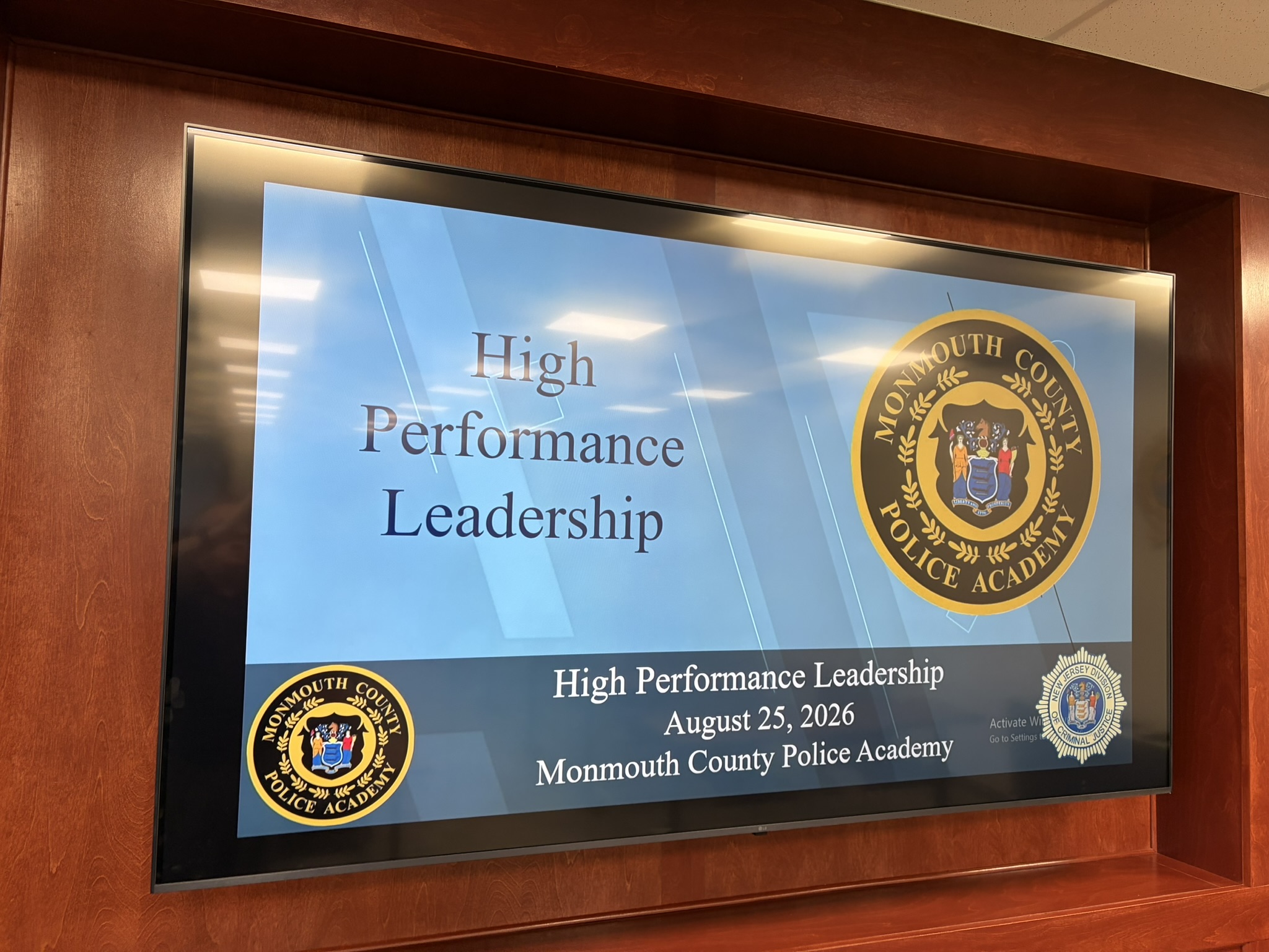 PowerPoint screen with the title slide of a class called High Performance Leadership